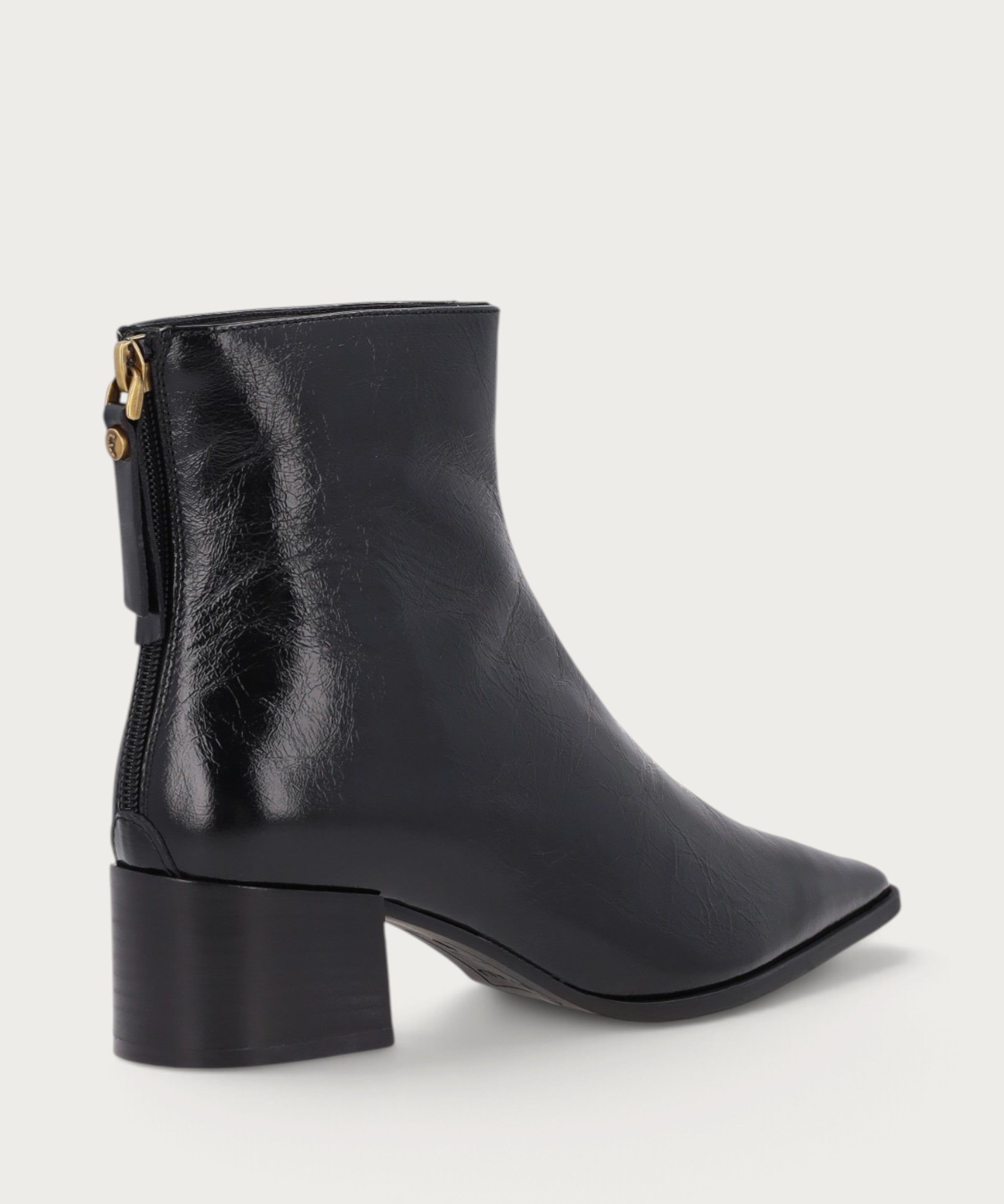 Elegant heeled ankle boots in polished black leather