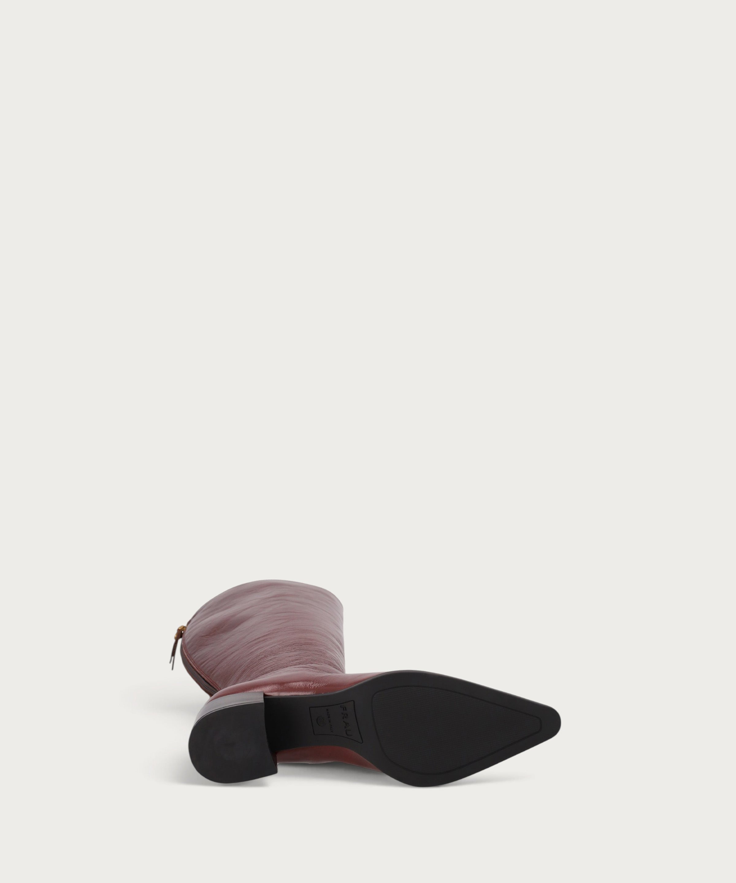 Knee-high heeled boots in burgundy polished leather