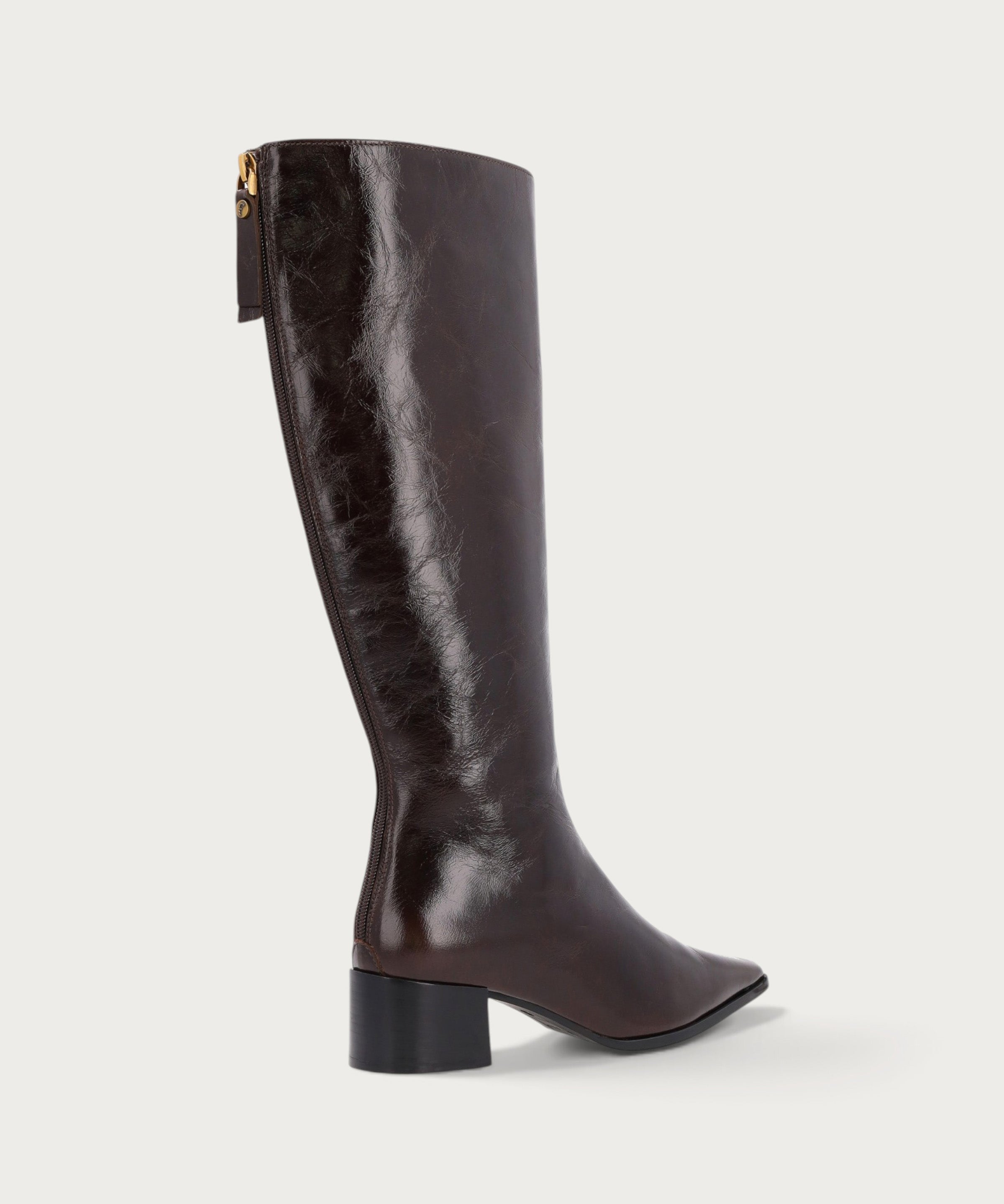 Knee-high heeled boots in brown polished leather