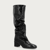 Heeled gathered boots in black polished leather