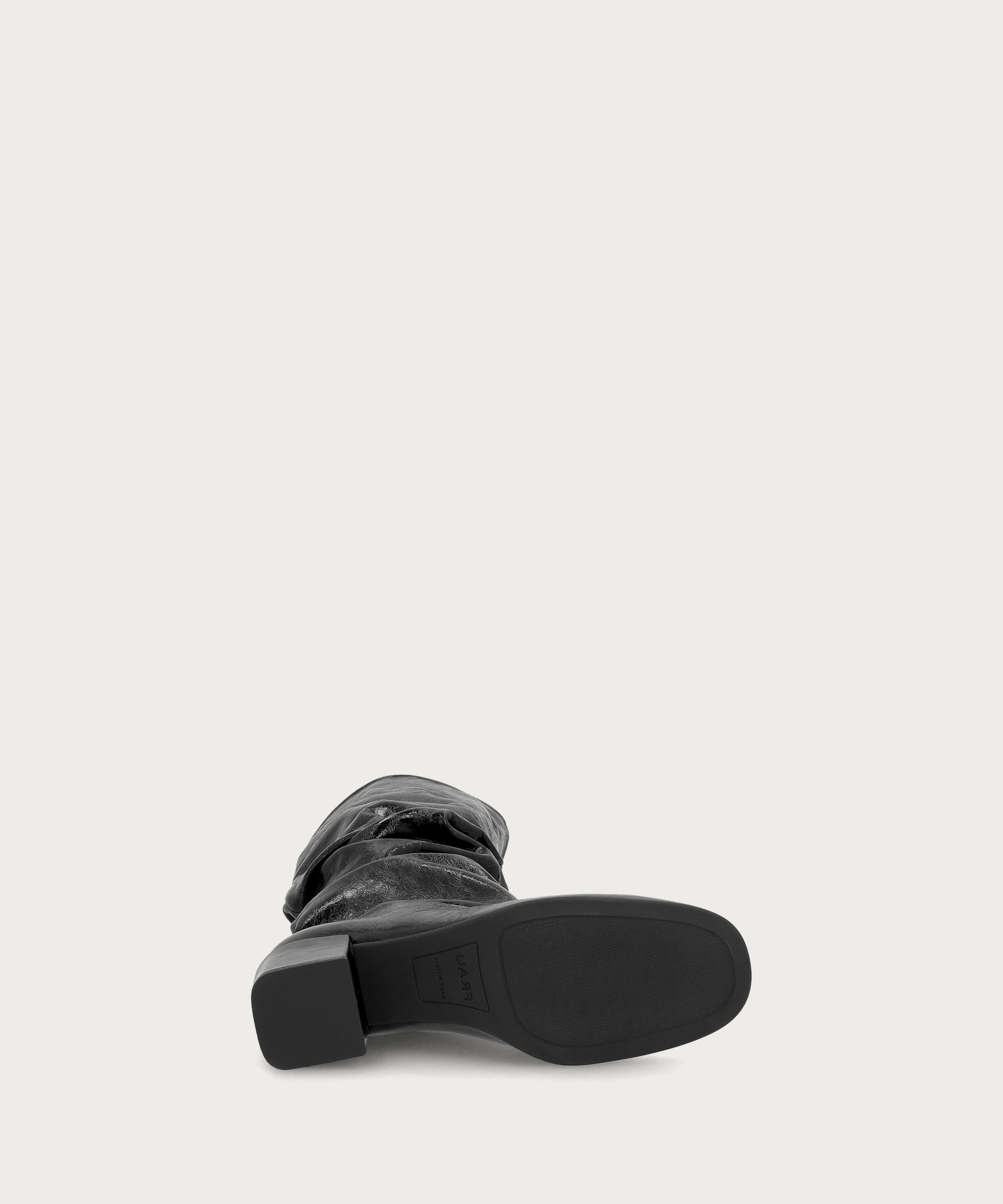 Heeled gathered boots in black polished leather