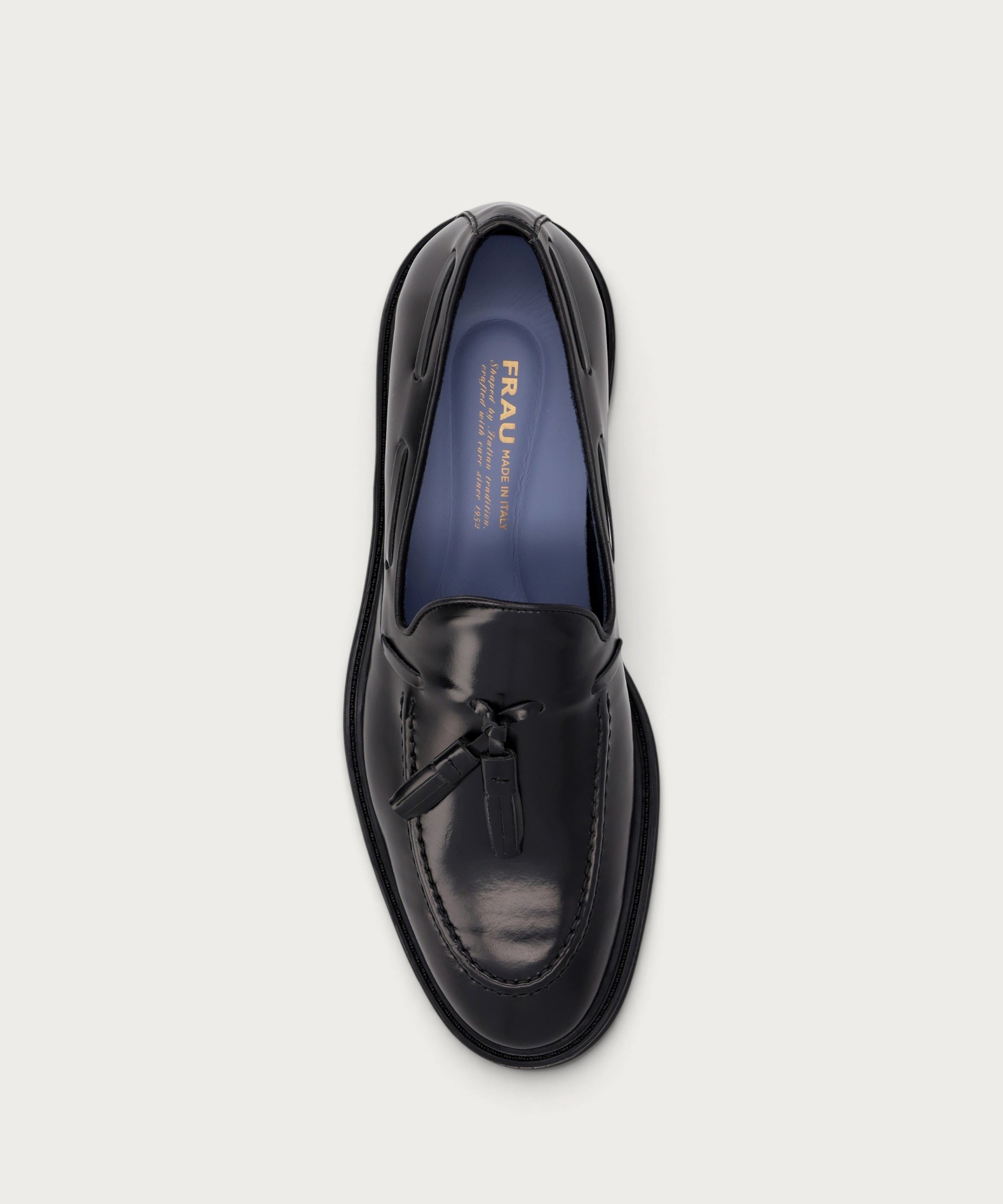 Men's elegant polished black calfskin loafers with tassels