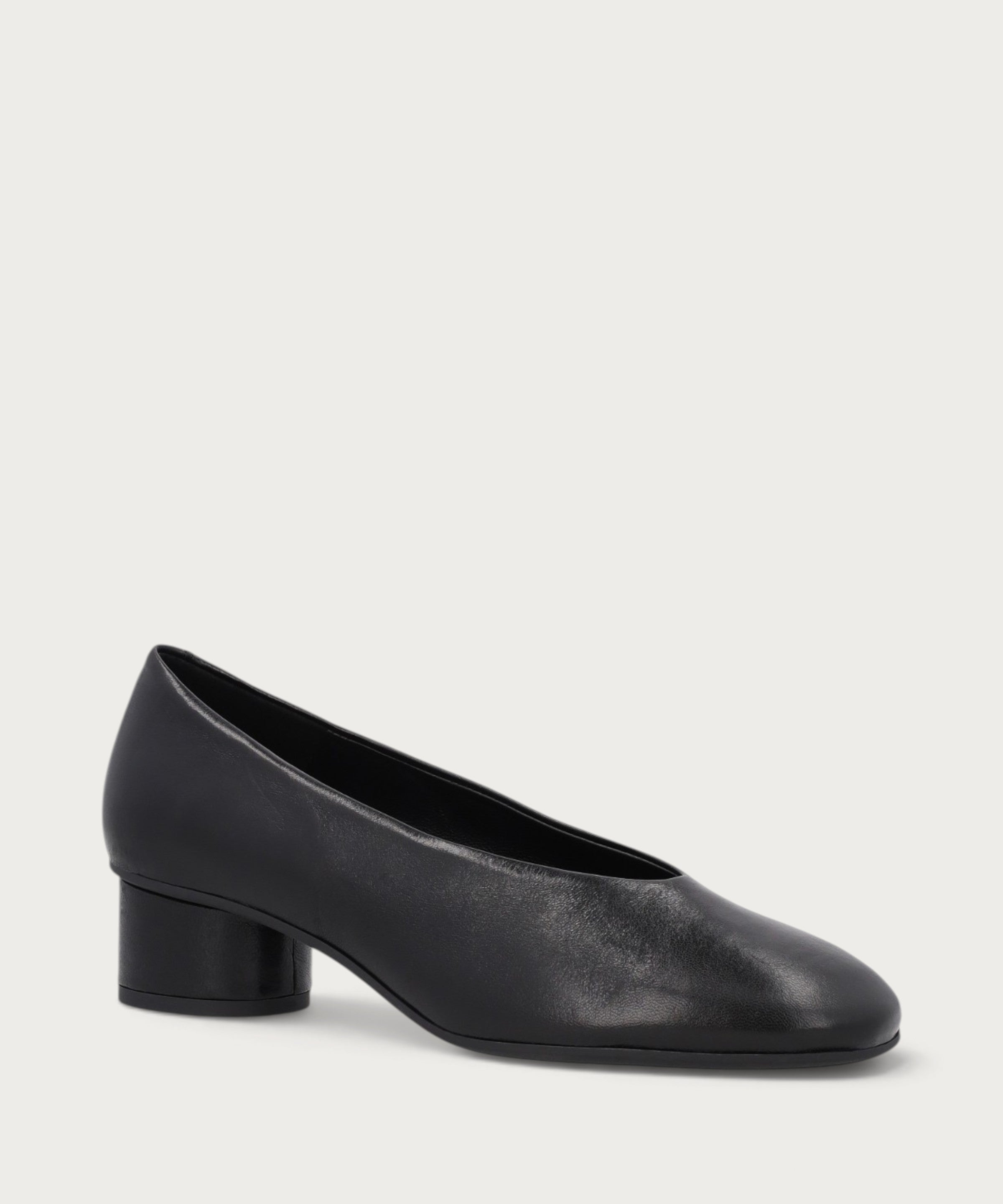 Black leather almond-toe pumps with round heel