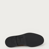 Women's brown suede loafers with tie detail