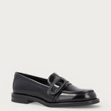Women's polished black leather loafers with buckle