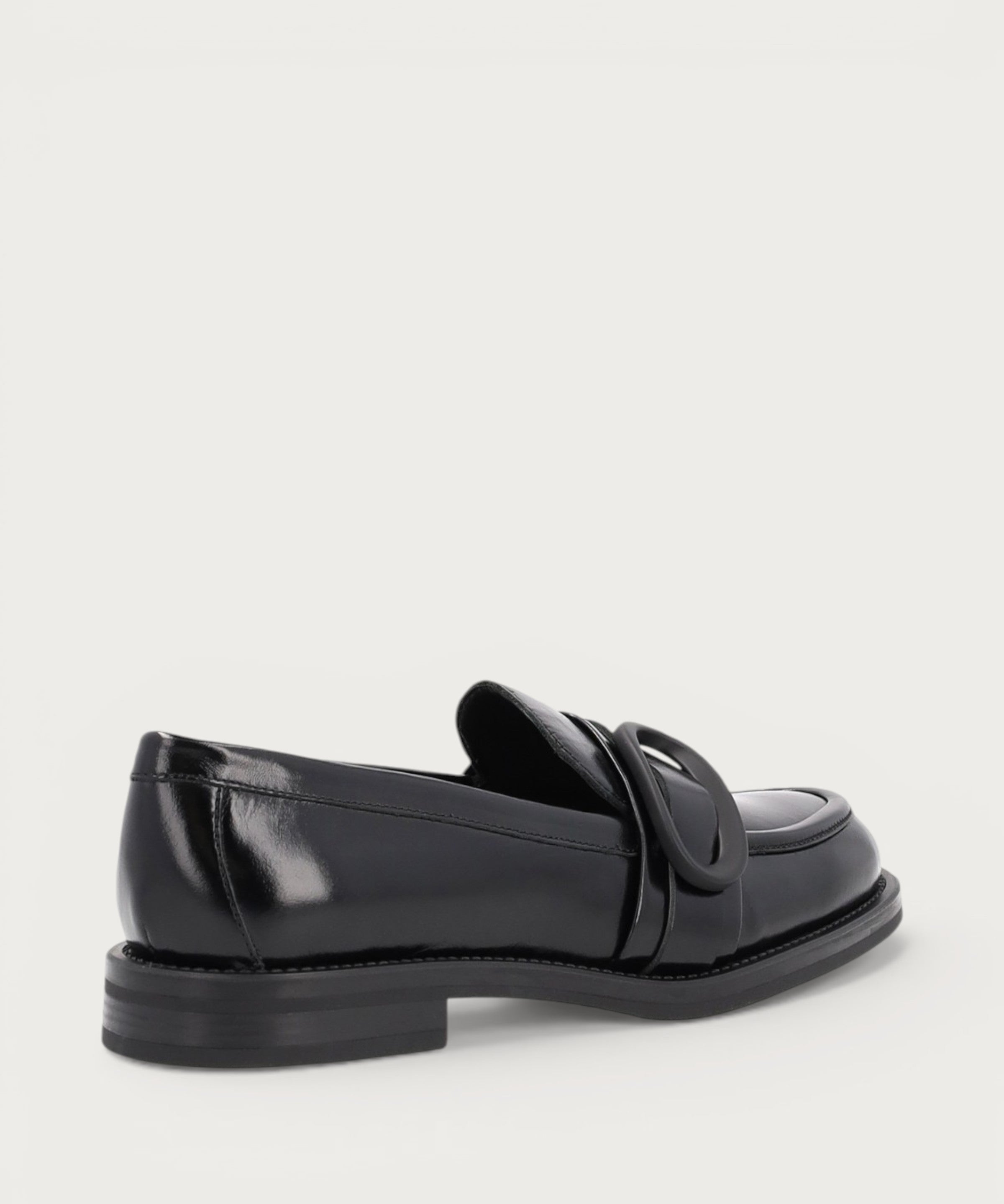 Women's polished black leather loafers with buckle
